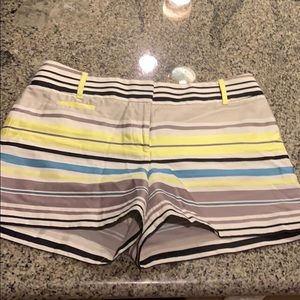 Yellow, green, black, teal striped shorts!